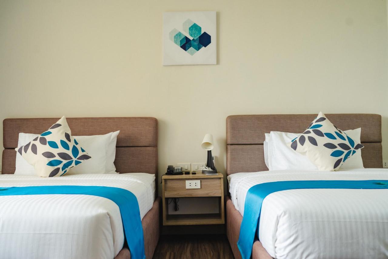 River Palm Hotel And Resort Powered By Cocotel Bugallon Pokoj fotografie